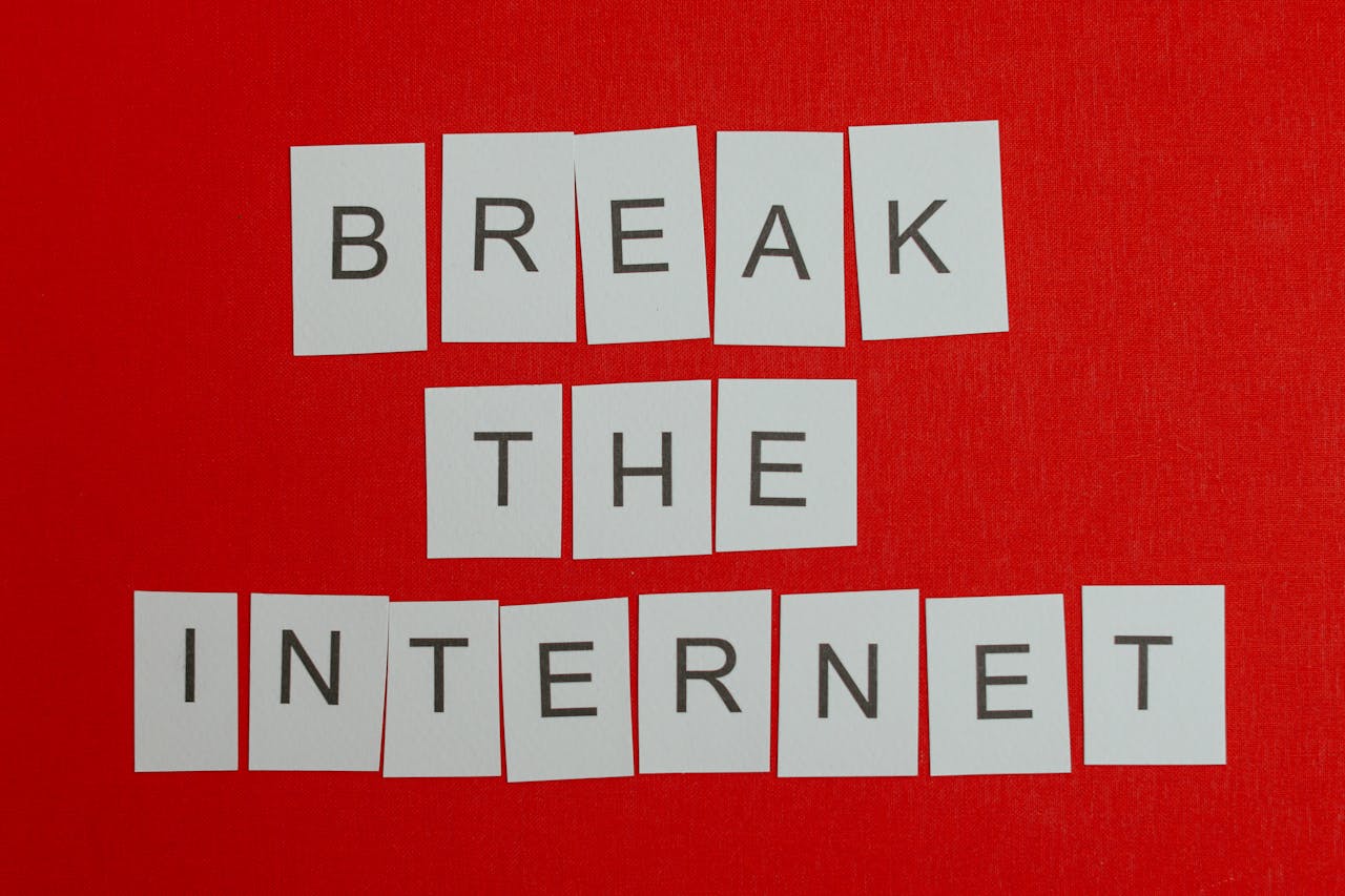 Inspirational message 'Break the Internet' displayed on a vibrant red background.